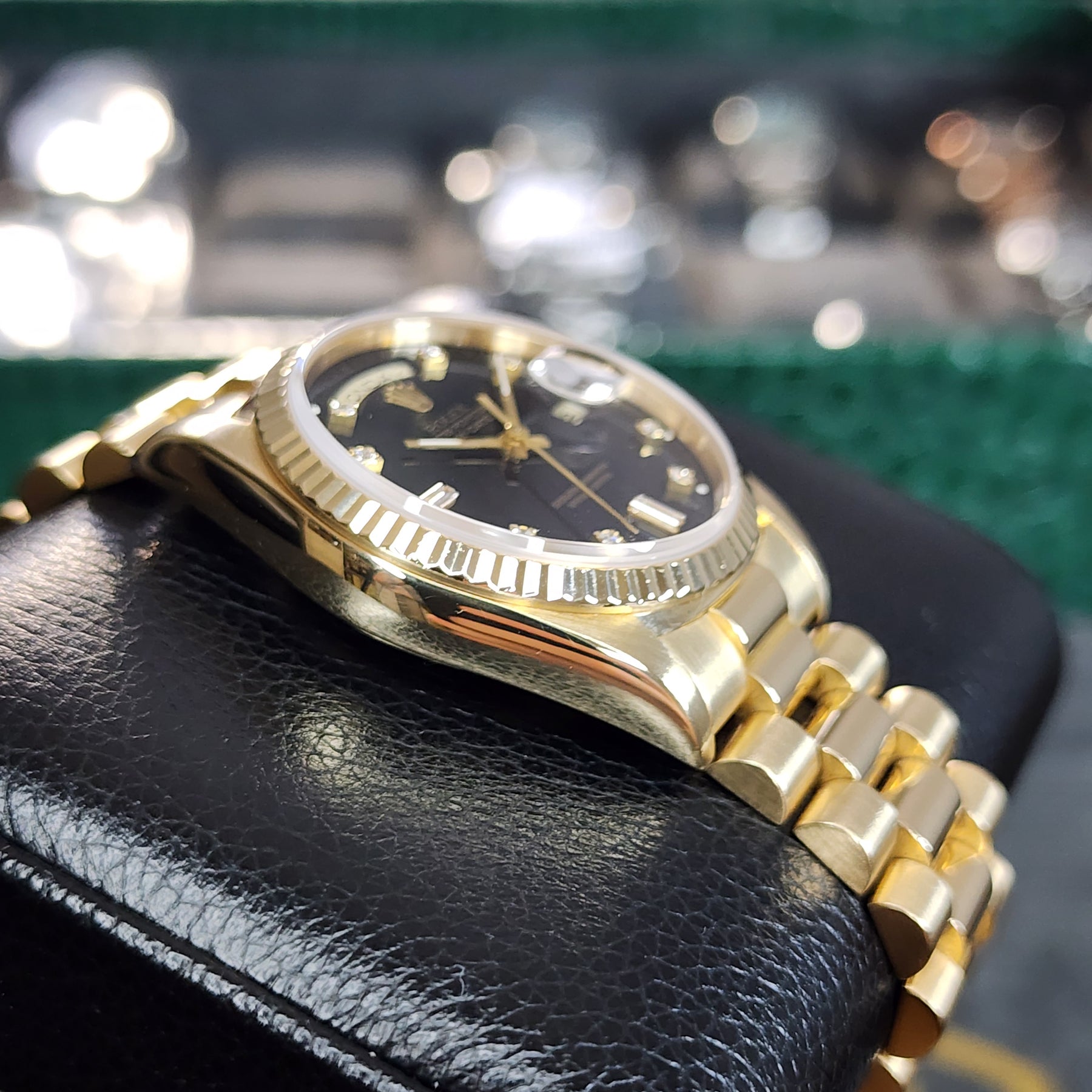 Rolex Day-Date 36 Diamond Baguette Dial 18238 left side view