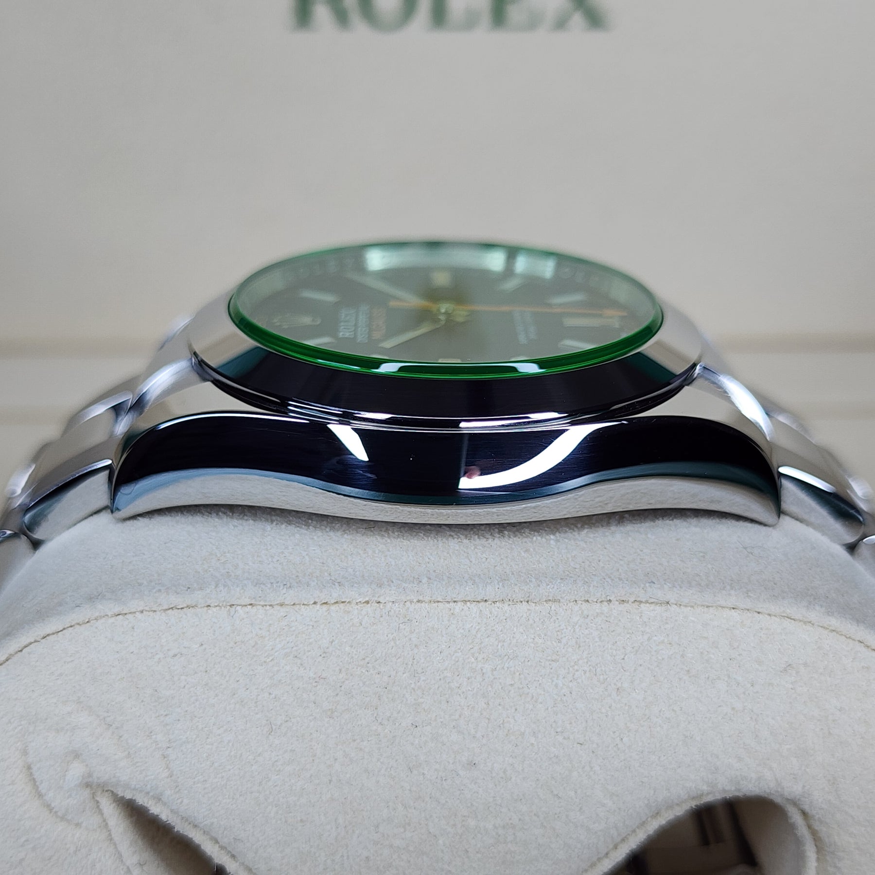 Rolex Milgauss Black Dial Green Crystal 116400GV crown view