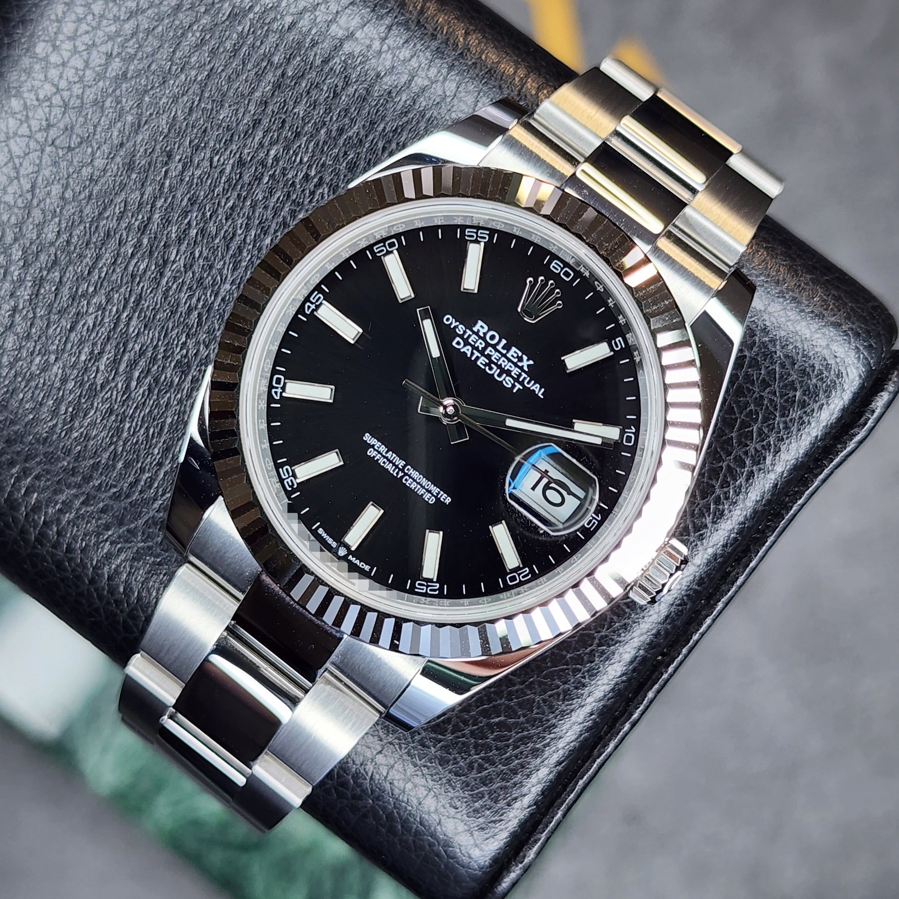 Rolex Datejust Bright Black Dial 136334 front view