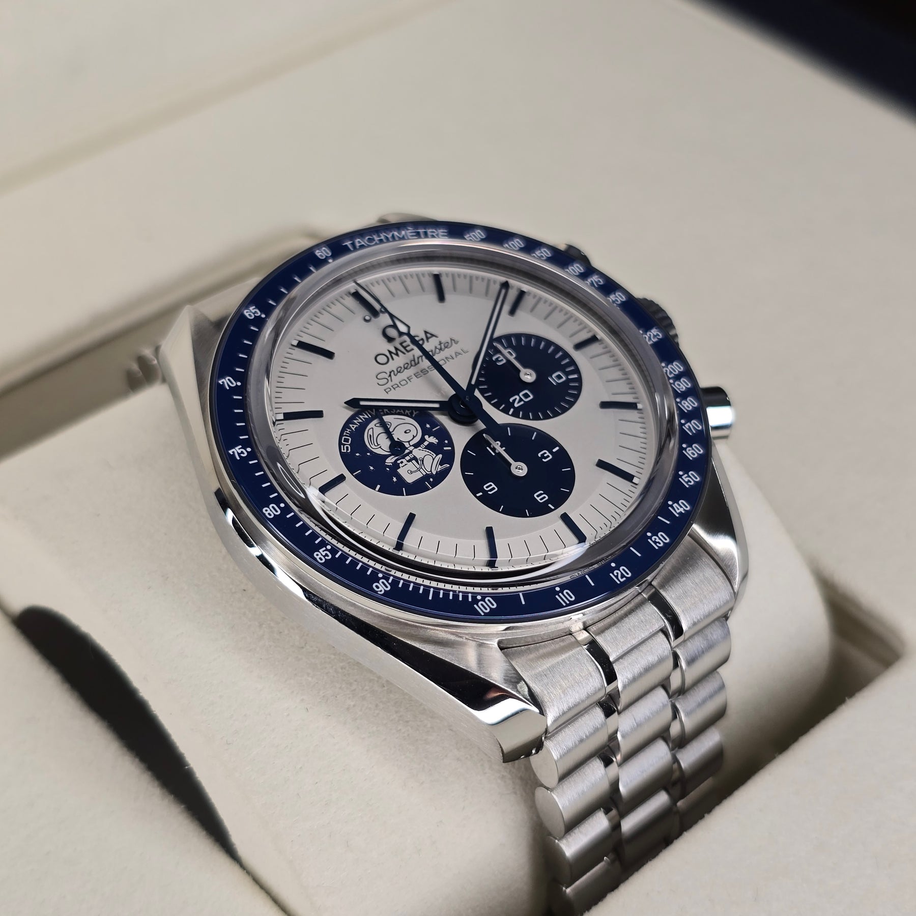 Omega Speedmaster Silver Snoopy left side case view