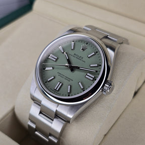 Rolex Oyster Perpetual 134300 Pistachio case right