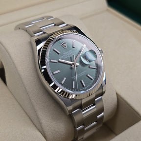 Rolex Datejust 126234 Mint Oyster left side case