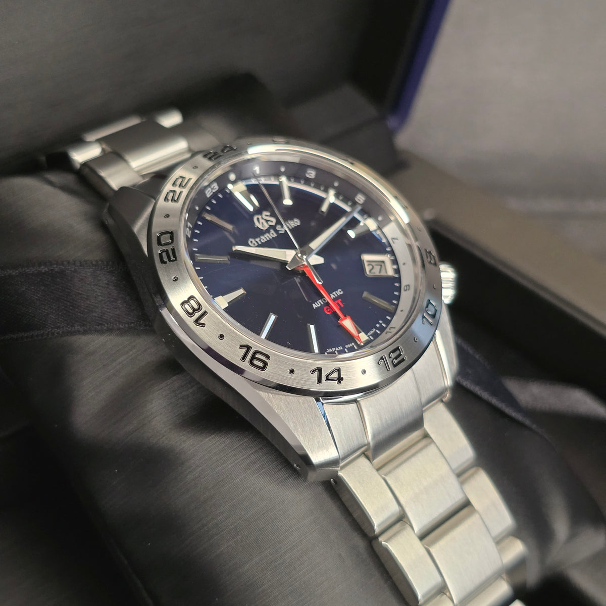 Grand Seiko Sports SBGM245 GMT left side case view