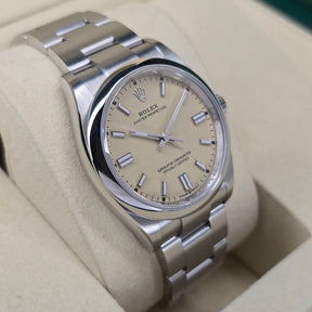 Rolex Oyster Perpetual Beige 126000 left side case