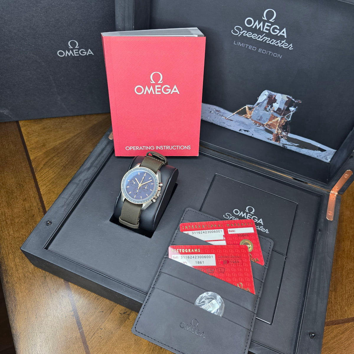 Omega Speedmaster Apollo 11 45th Anniversary 311.62.42.30.06.001  full set