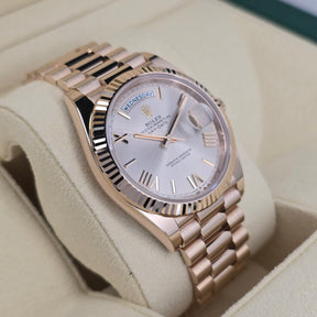 Rolex Day-Date Rose Gold Sundust 228235 left side case